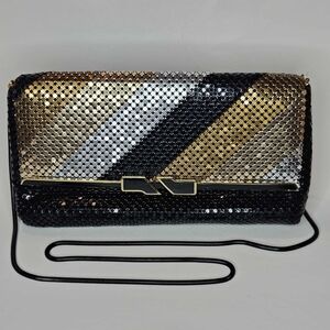 Elegant Black and Gold Sequin Clutch